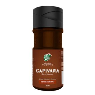fundo branco, capivara kamaleao colors ao centro. embalagem de tampa preta contendo um liquido marrom, e rotulo marrom escrito capivara ruivo dourado. cabelos hidratados e brilhantes. produto vegano, não testado em animais.