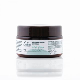Fundo branco com embalagem marrom escura ao centro da imagem com rótulo branco descrito Cativa Natureza, Máscara facial de argila, pele oleosa, argila verde, argila preta, copaíba e Tea Tree.
