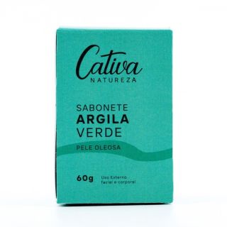 Fundo branco com caixa verde ao centro da imagem descrito Cativa natureza sabonete argila verde pele oleosa 60g uso externo facial e corporal.